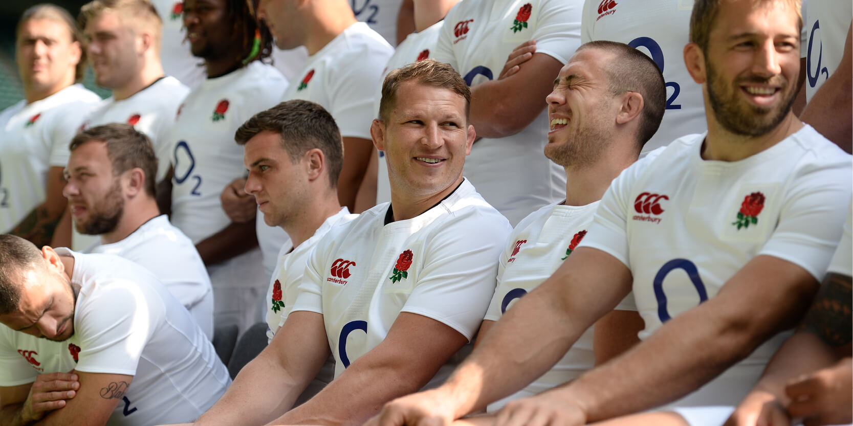 Former England Rugby player Dylan Hartley smiling in a squad photo when he was playing for the team
