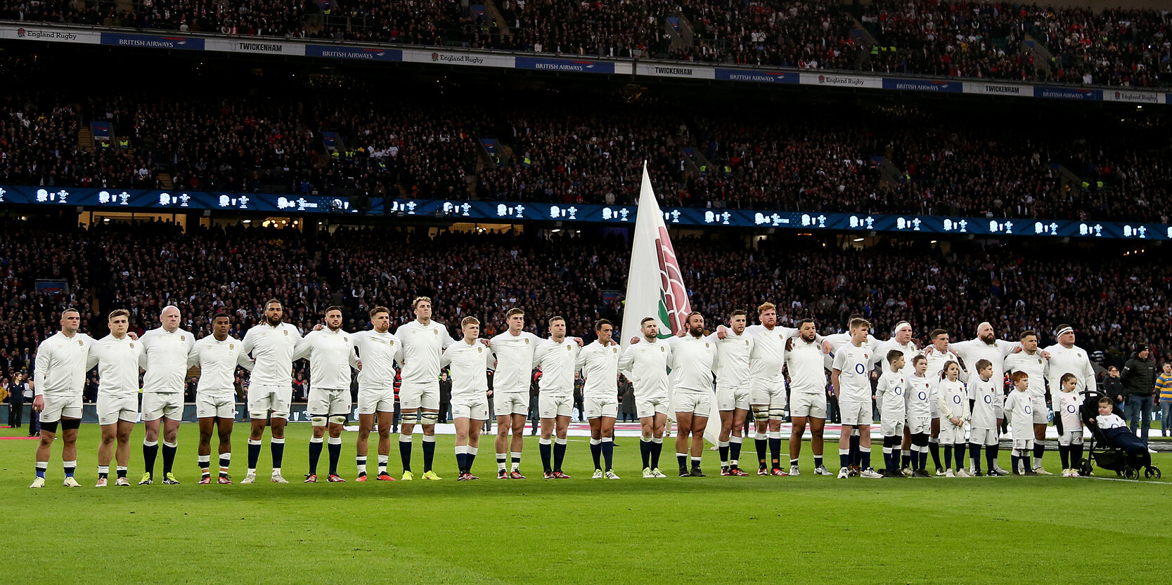 England Men's rugby team lining up for the national anthem at Twickenham Stadium for this match against Wales in the 2024 Guinness Men's Six Nations