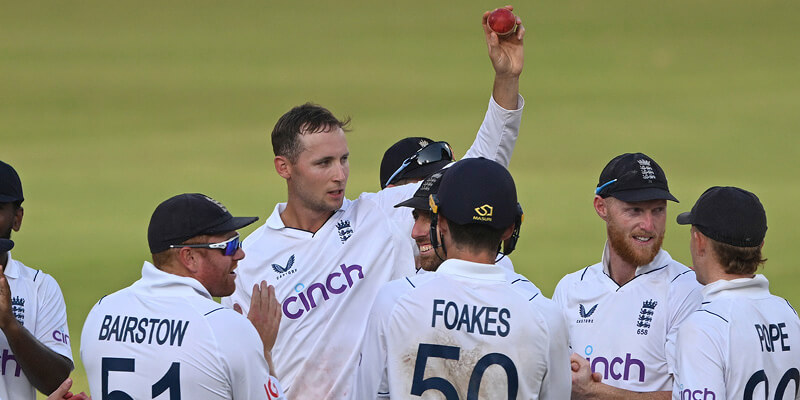 Tom Hartley celebrates taking a wicket against India