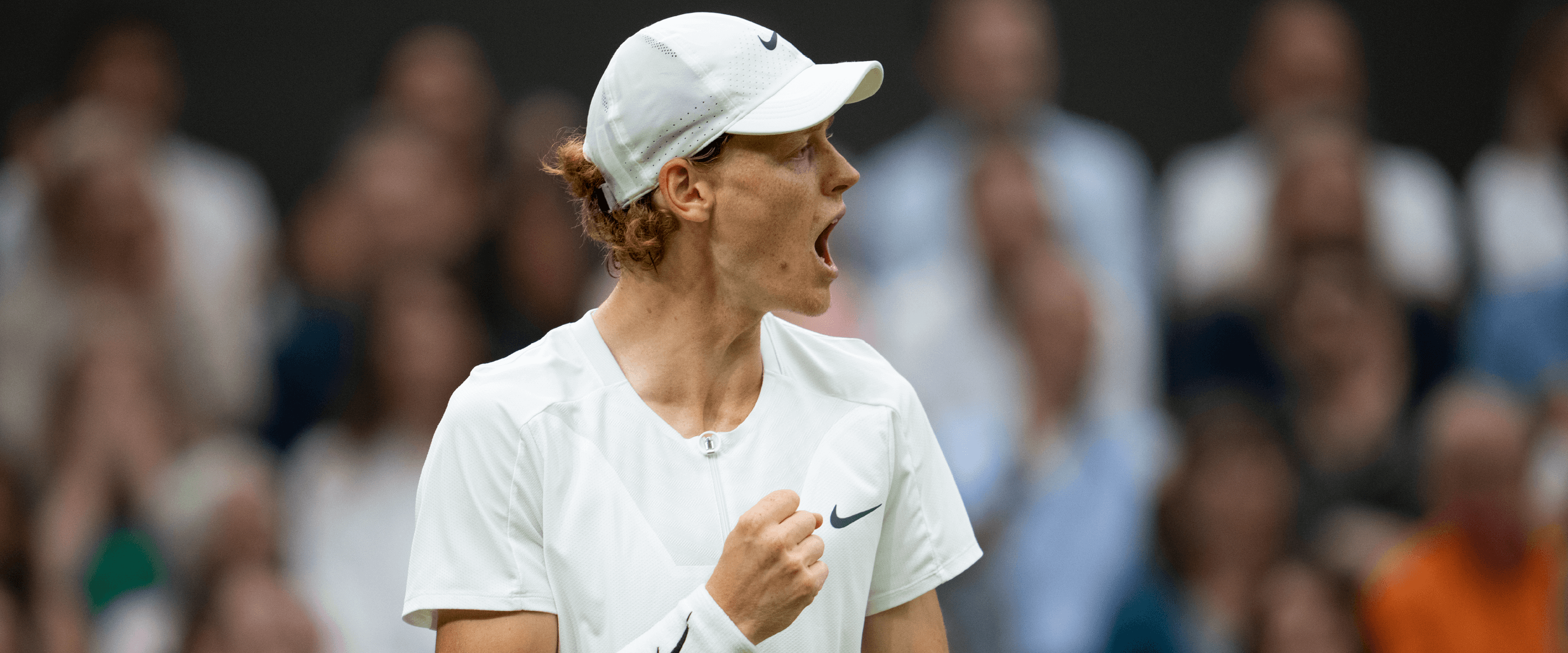 Italian tennis player Jannik Sinner at The Championships Wimbledon in 2023 playing on Centre Court