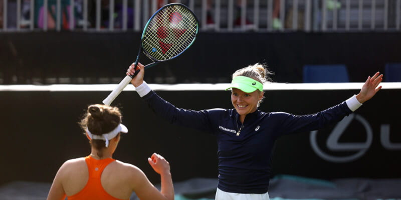 Harriett Dart celebrating a doubles win at The Rothesay International Tennis Tournament in Eastbourne 