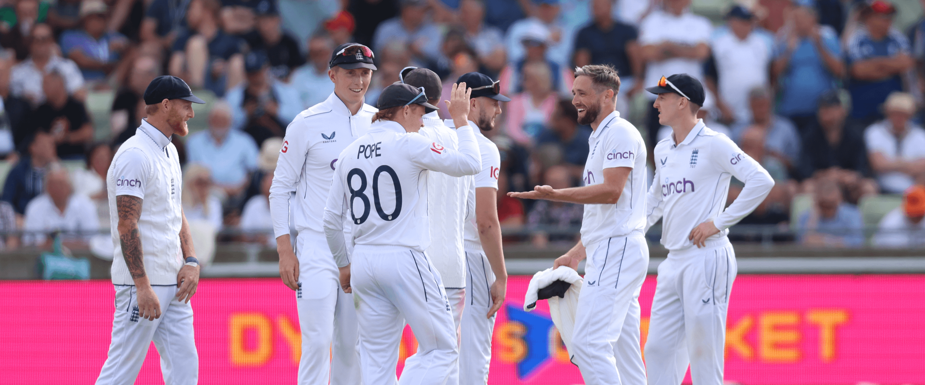 England Cricket Test squad celebrating during a match at Edgbaston Stadium