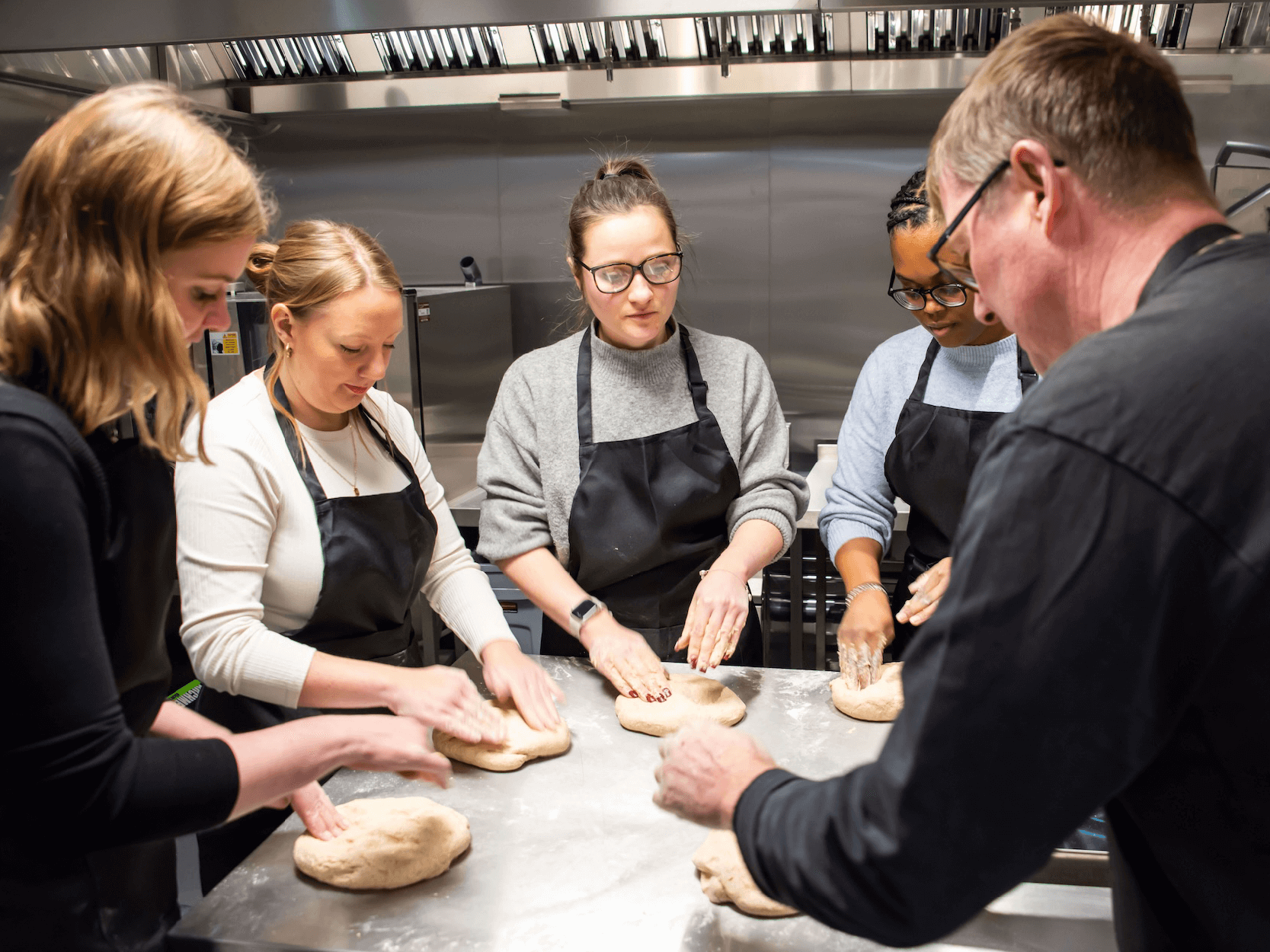 Chef teaching attendees how to bake in a class for Xcelerate at Edgbaston
