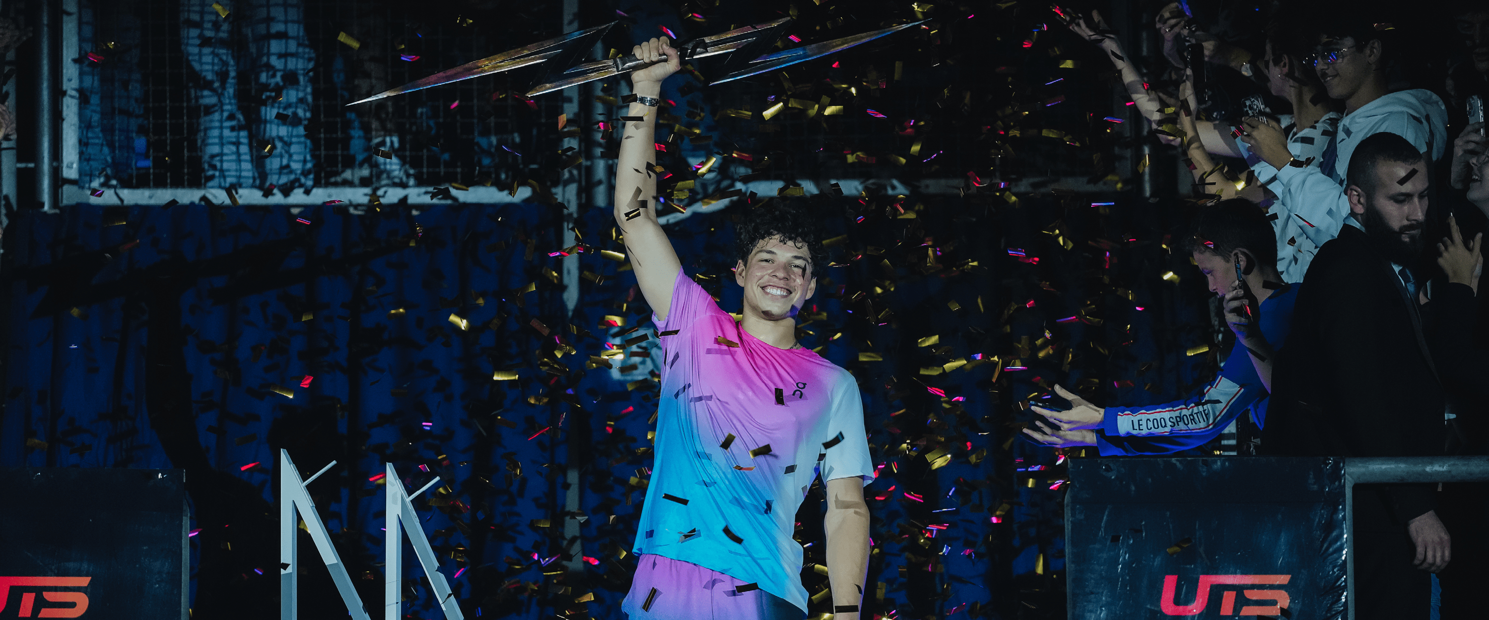 Winner of UTS Frankfurt and American tennis player Ben Shelton lifting the UTS trophy surrounded by confetti