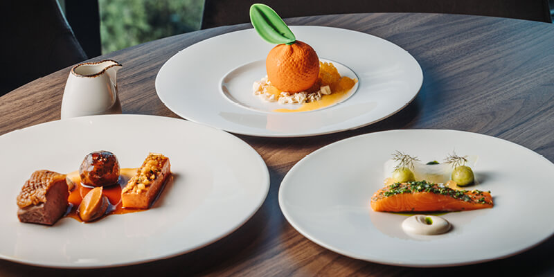 Three plated fine dining dishes that Lisa Allen-Goodwin will be cooking in The East Wing facility at England v Australia in the rugby Autumn Nations Series