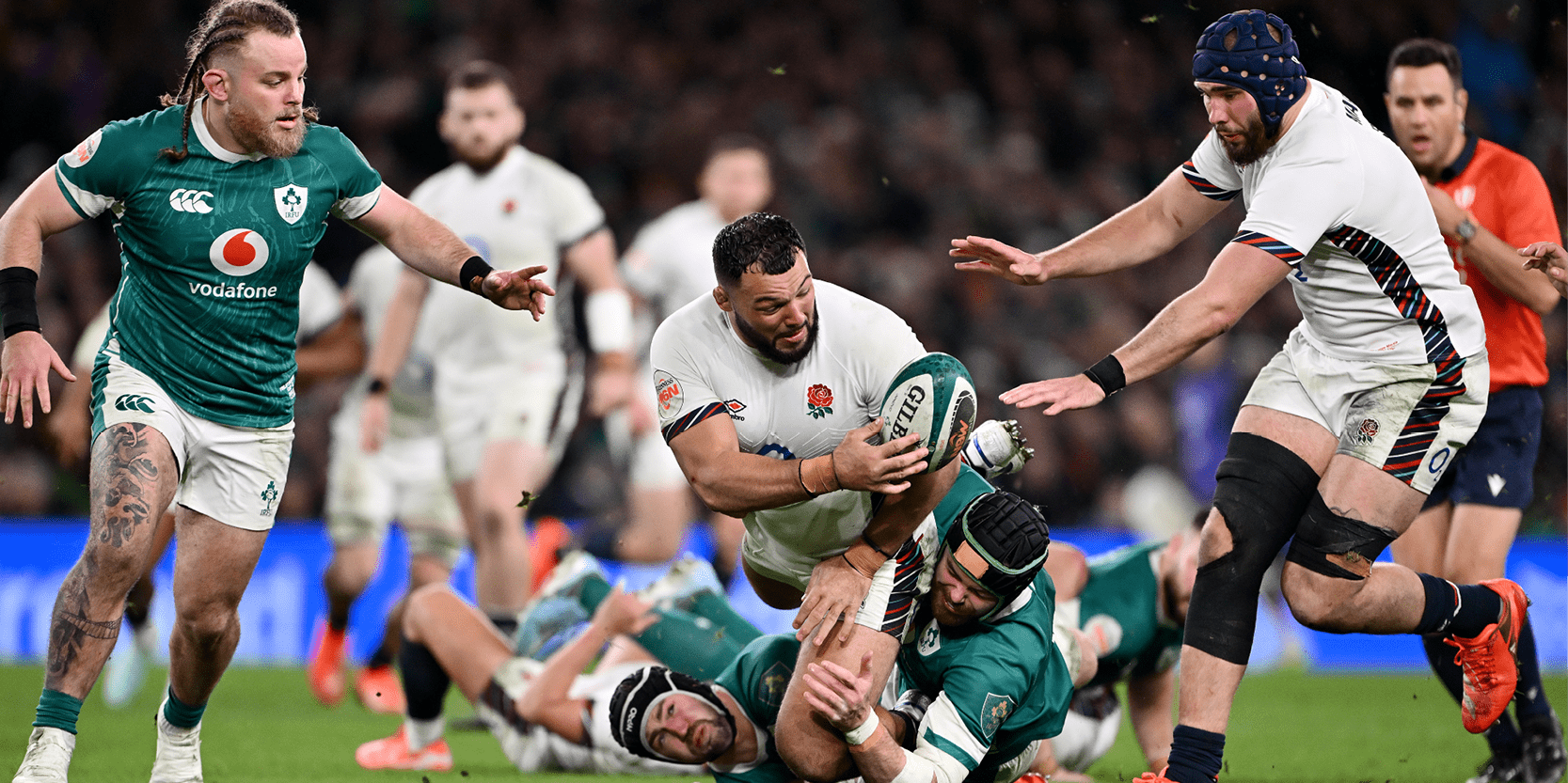 England Rugby player Ellis Genge passing the ball to a team mate in the 2025 Guinness Men's Six Nations tournament against Ireland