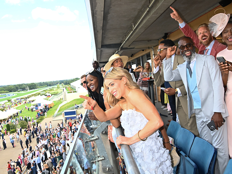 QIPCO King George Raceday guests enjoying the balcony views at Ascot Racecourse