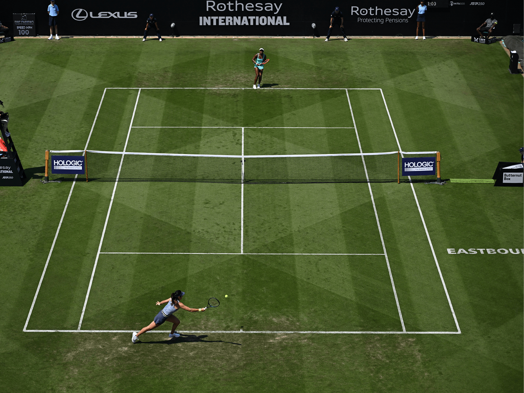 View of women's tennis players during a match on Centre Court at Eastbourne Tennis Club for the Rothesay International Eastbourne