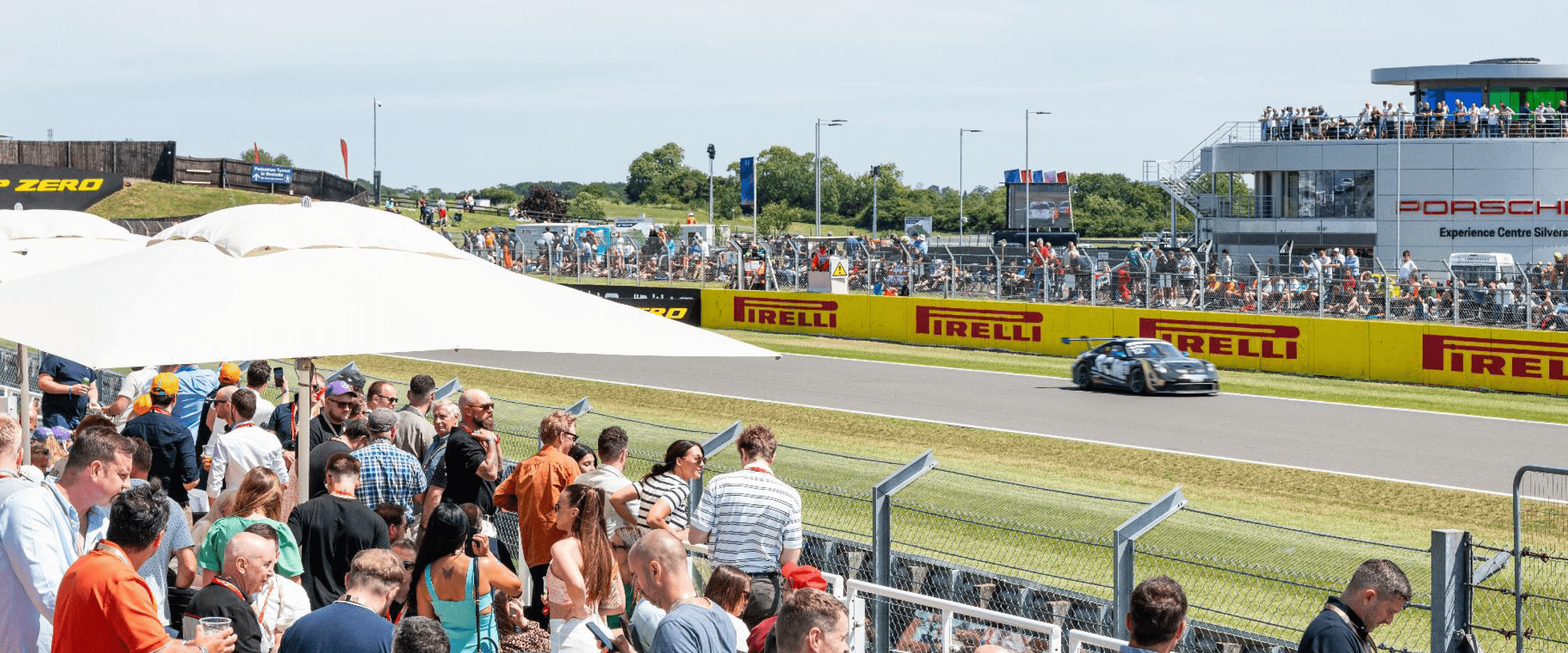 View of the Silverstone racetrack for the British Grand Prix Formula One with spectators in the grandstand