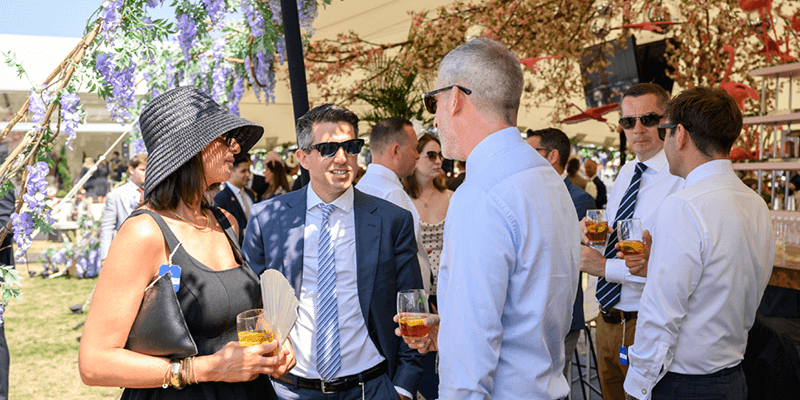 Guests enjoying a day out at Royal Ascot with their clients and colleagues