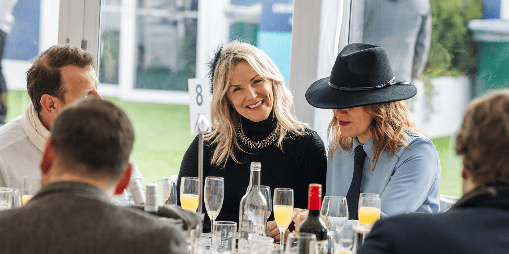 Guests enjoying a dining experience in hospitality at the Cheltenham Festival