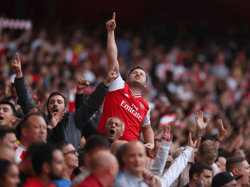 Arsenal fan celebrating