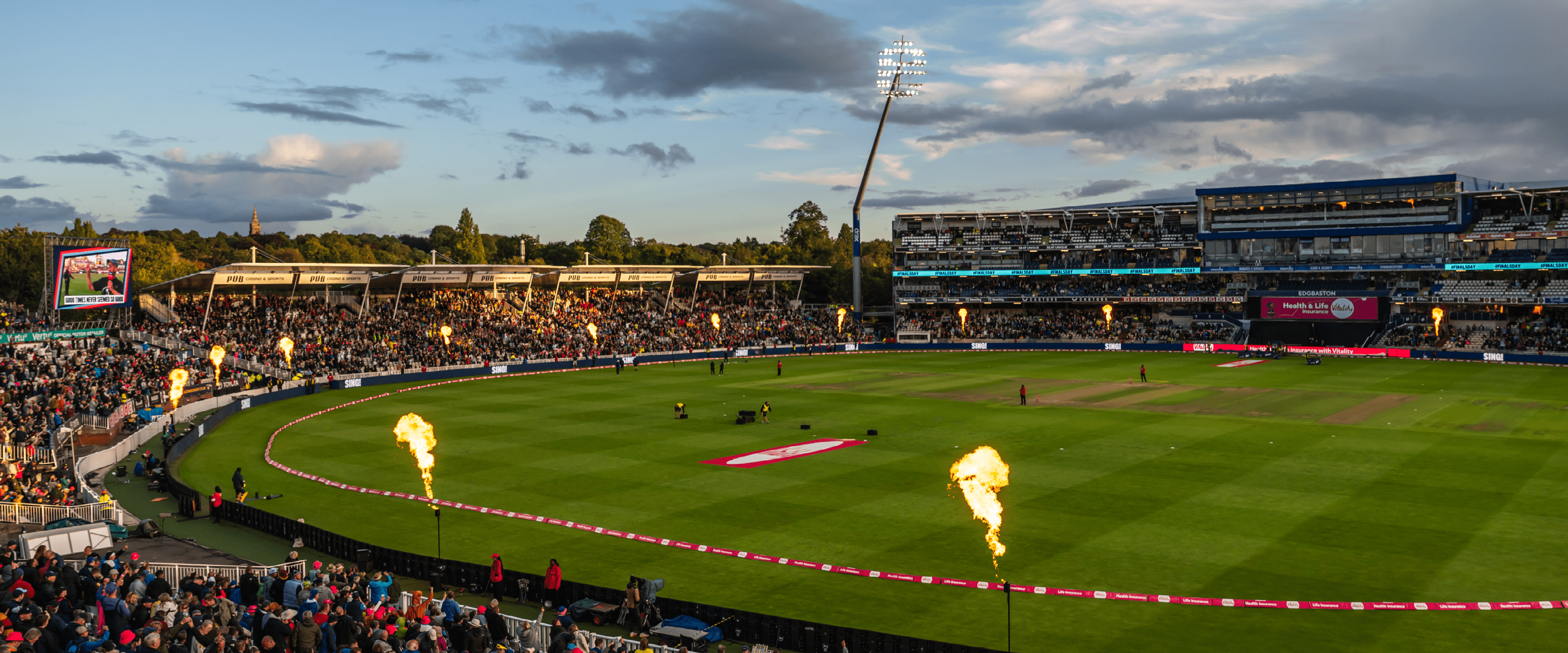 Edgbaston Stadium surrounded by flares for the final fixture of T20 Finals Day