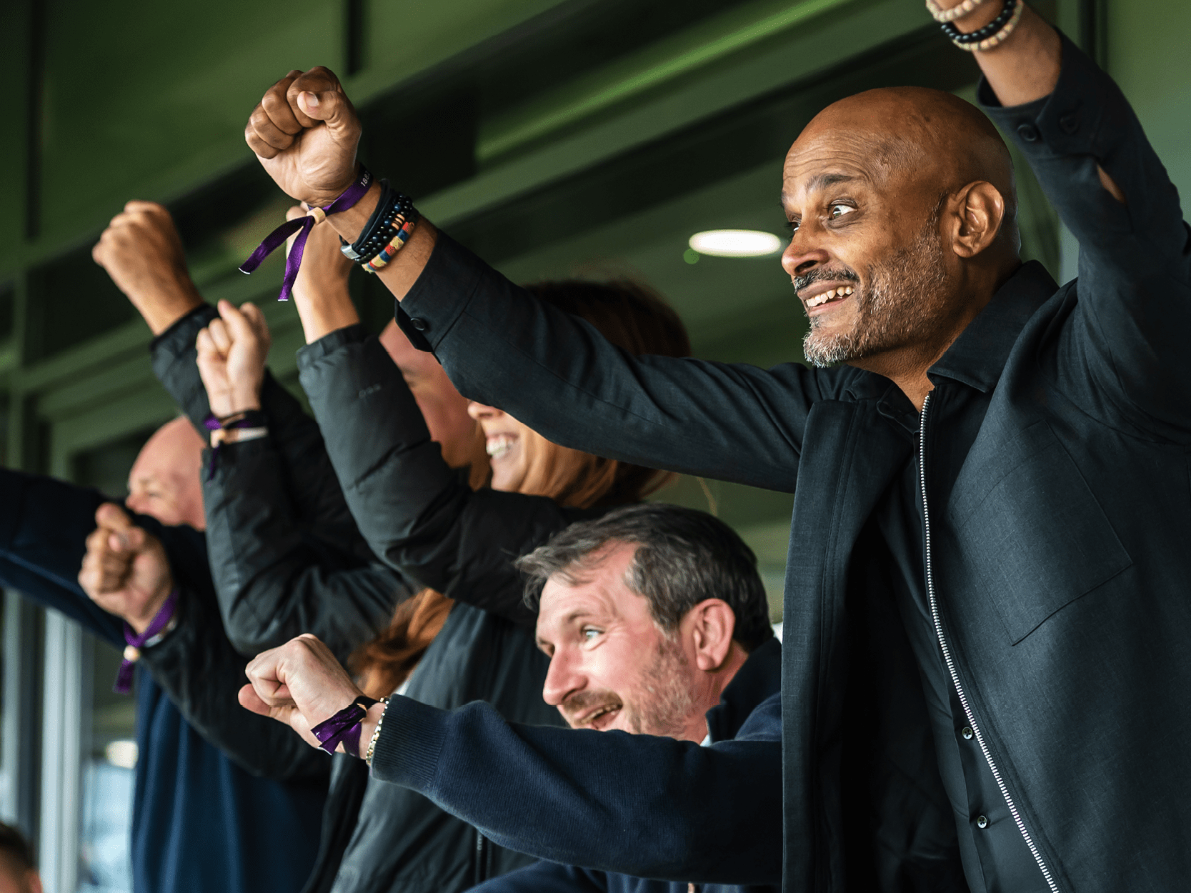 Cricket fans celebrating a win during T20 Finals Day at Edgbaston Stadium