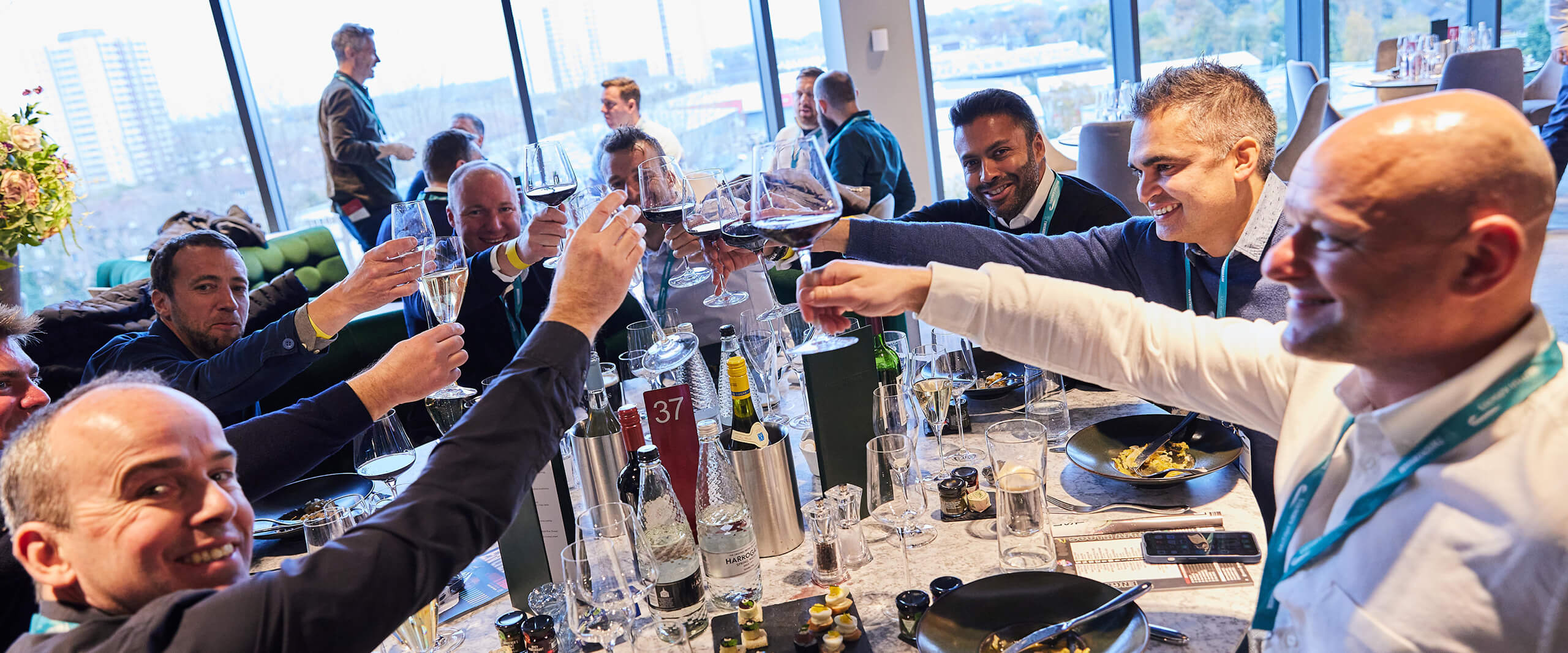 Guests enjoying themselves at the table in The East Wing at Twickenham Stadium