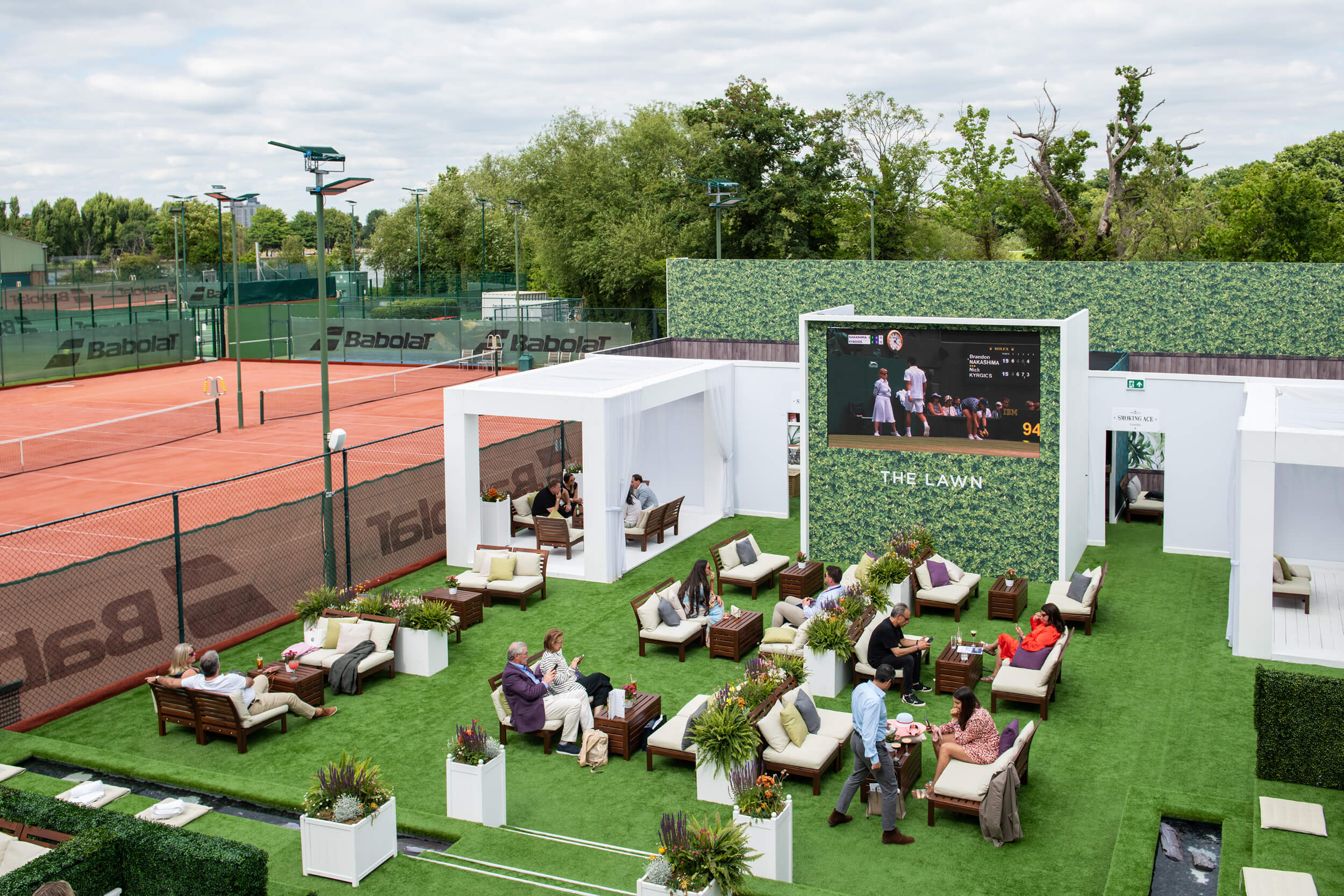 Guests enjoying the garden at The Lawn hospitality