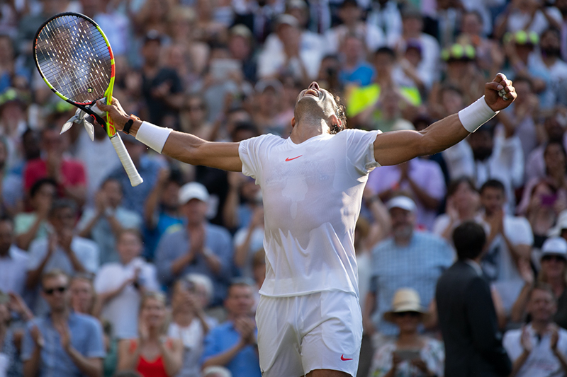 Rafael Nadal celebrating a win at The Championships Wimbledon on Centre Court