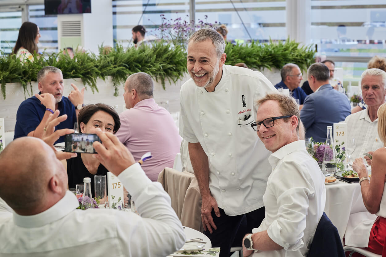 Michel Roux Jnr with guests in The Lawn facility at The Championships Wimbledon
