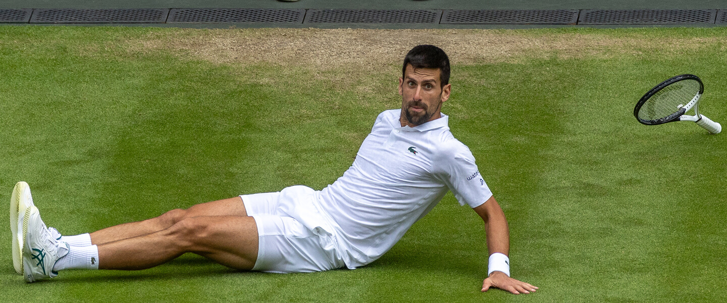 Novak Djokovic playing at Wimbledon