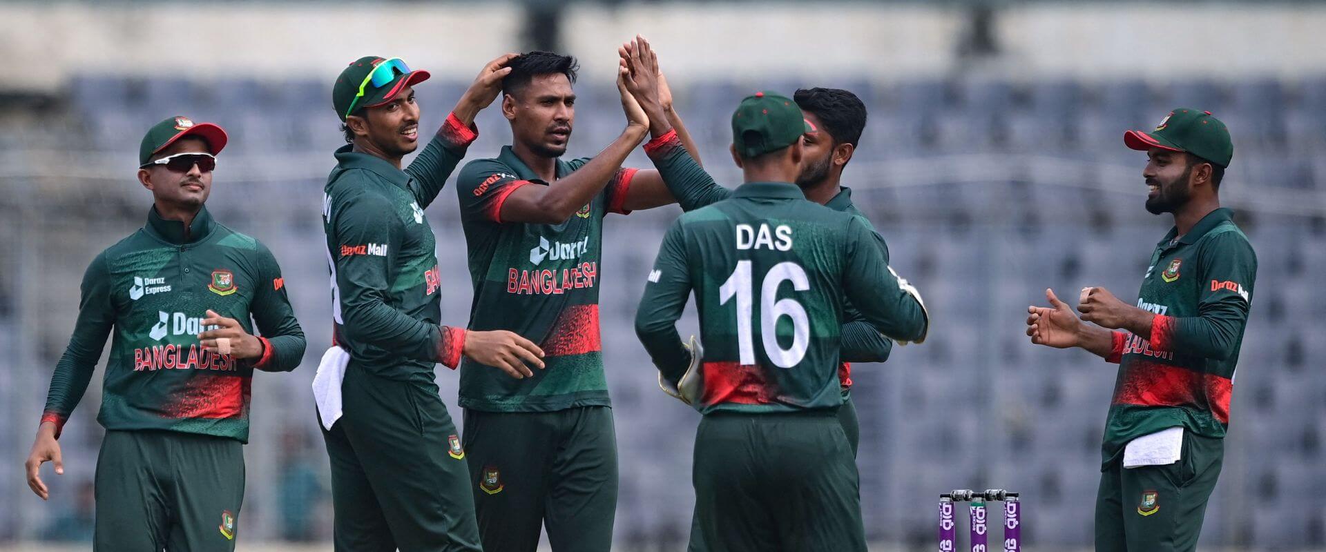 Bangladesh cricket team celebrate taking a wicket