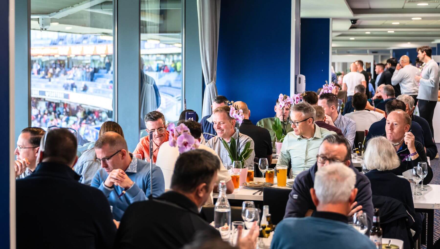Guests enjoying hospitality in 1882 Club