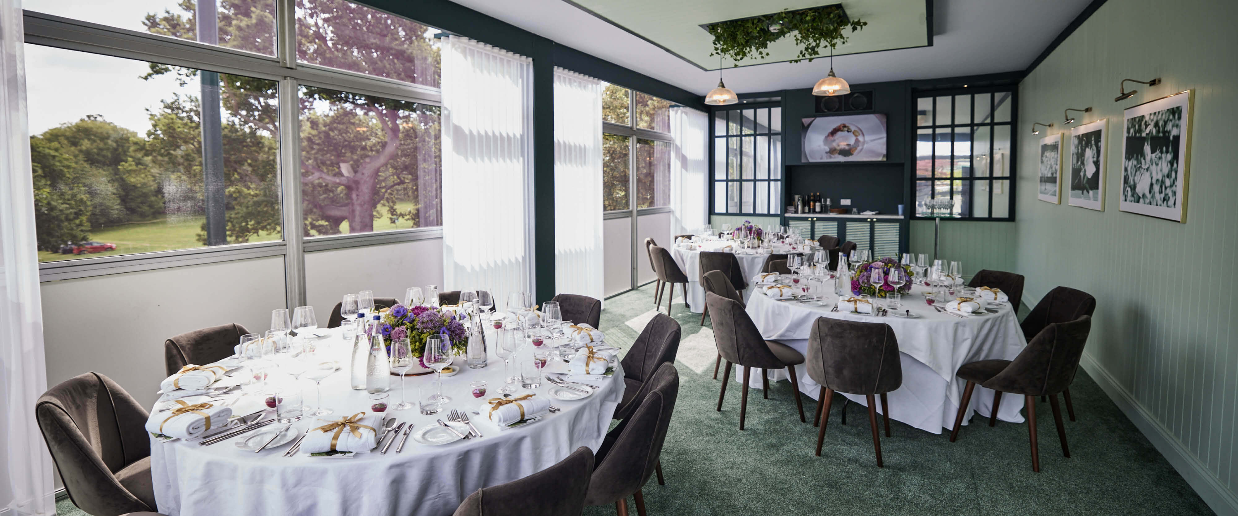 Tables set for guests in the Rosewater Pavilion Private Dining area at The Championships Wimbledon