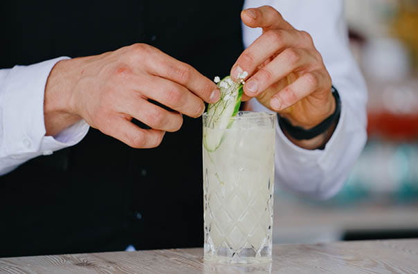 Cocktail being make by a mixologist in The Lawn garden at The Championships Wimbledon