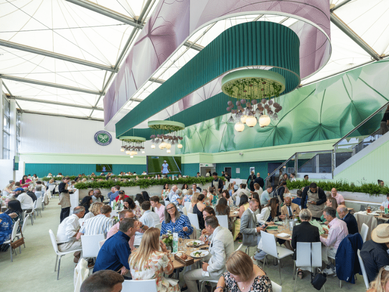 large hospitality suite at wimbledon filled with guests